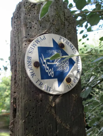 pymmes brook trail signpost in edmonton