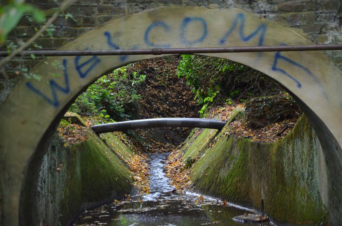 welcome grafitti over pymmes brook