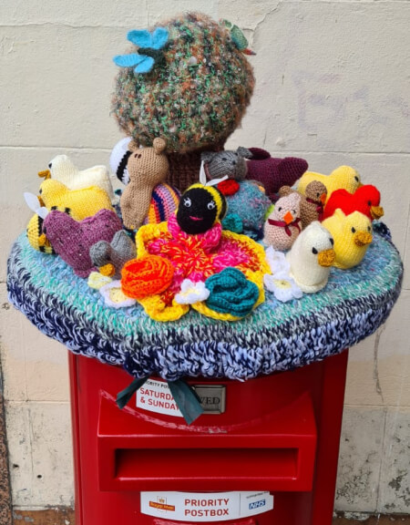 yarn bombed postbox outside stitch