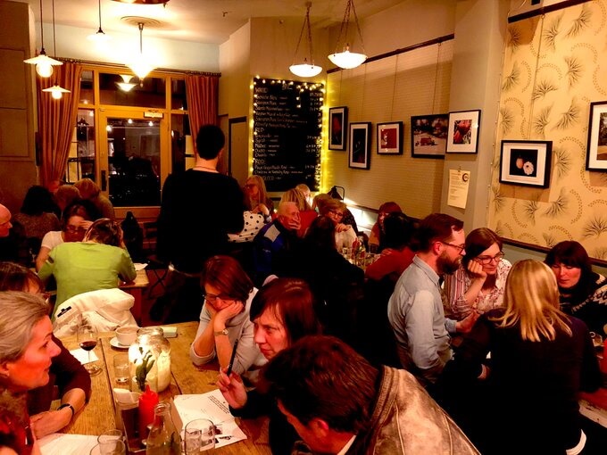 crowded tables in the step myddleton road while a quiz night was in progress