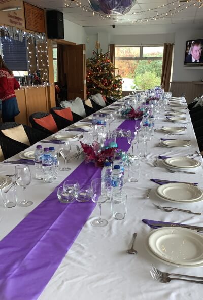 table laid for meal in the mayfield tennis club clubhouse