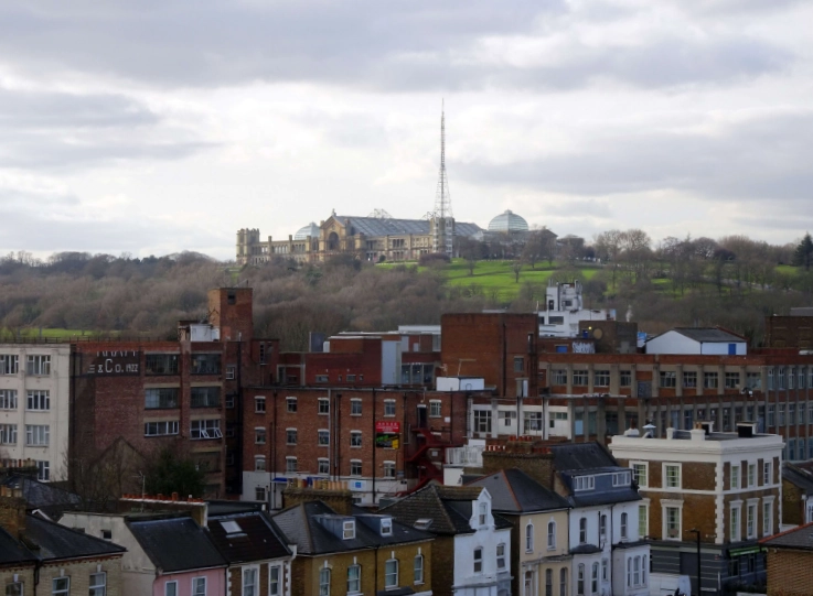 view from an upper floor of the mall wood green showing the view across to alexandra palace on a hilltop surrounded by parkland