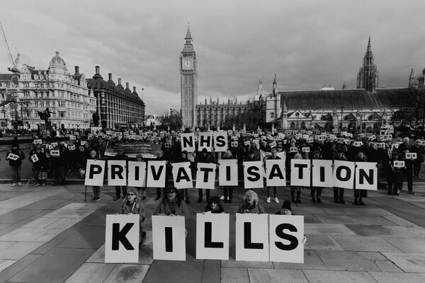 nhs privatisation kills demo in parliament square february 2023