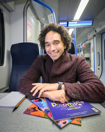 Joseph Coelho on a thameslink train