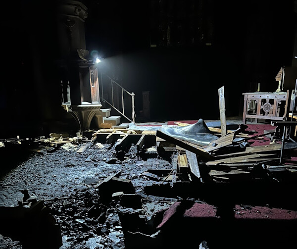 interior of st johns church palmers green showing fire damage january 2024