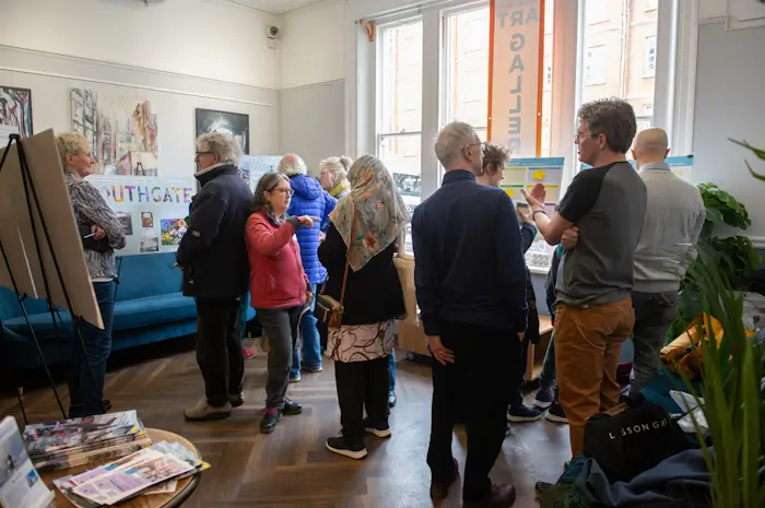 visitors discuss southgate urban realm improvements in the art gallery at the southgate club 1